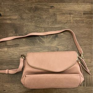 Mauve pink small over the shoulder purse.
